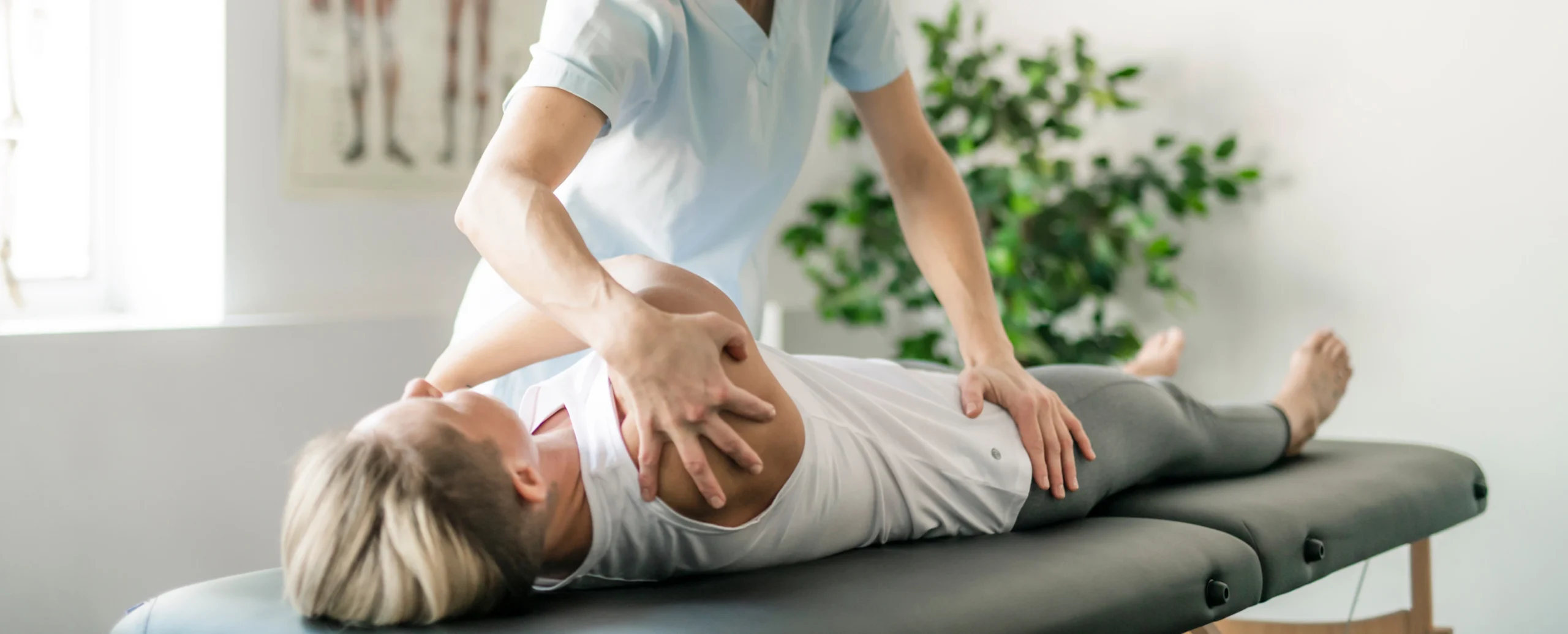 Doctor providing chiropractic examination